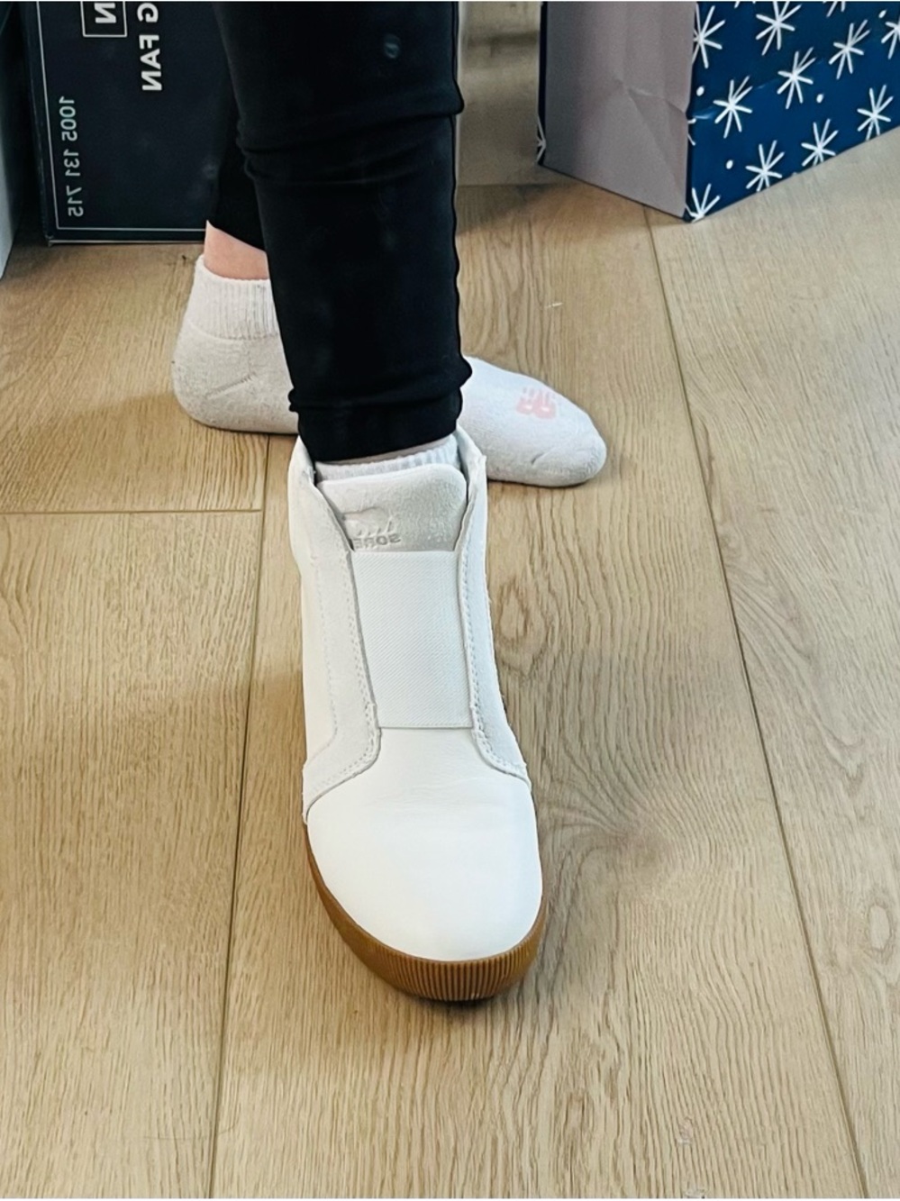 Sorel White Slip-On High-Top Sneaker with Gum Sole